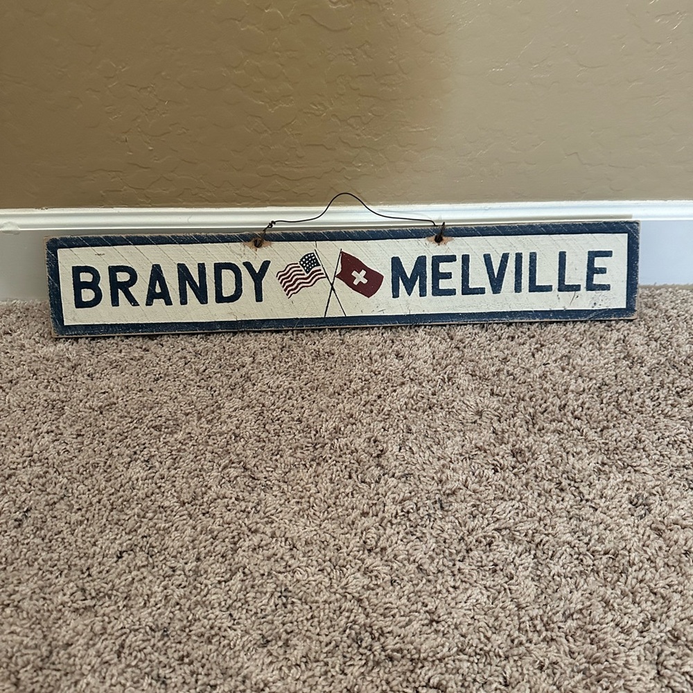 Brandy Melville wood sign